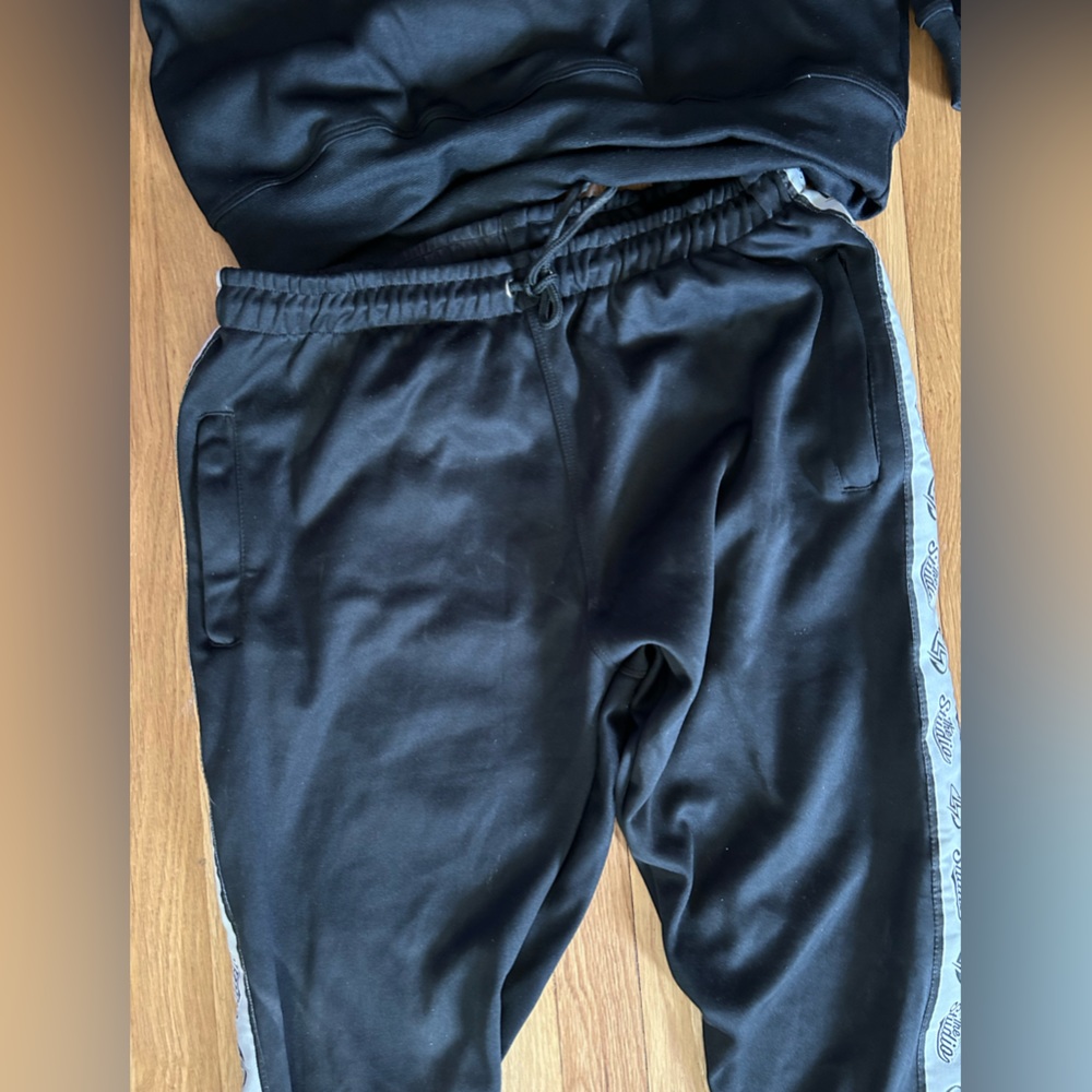 New in the bag black sweatshirt and sweatpants sealed in package.  Sz S, Med, XL - Picture 5 of 13